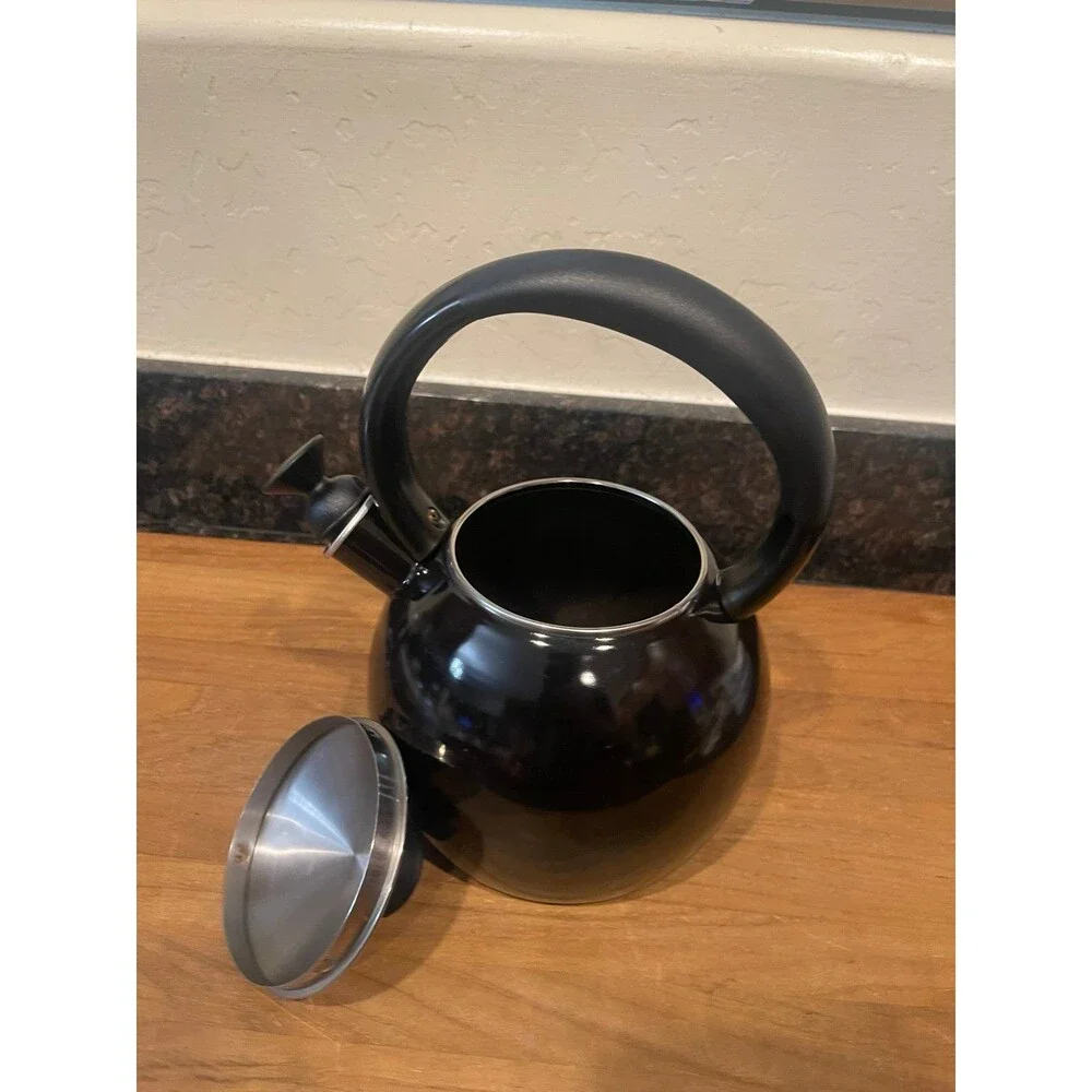 Copco black enameled tea pot with whistler